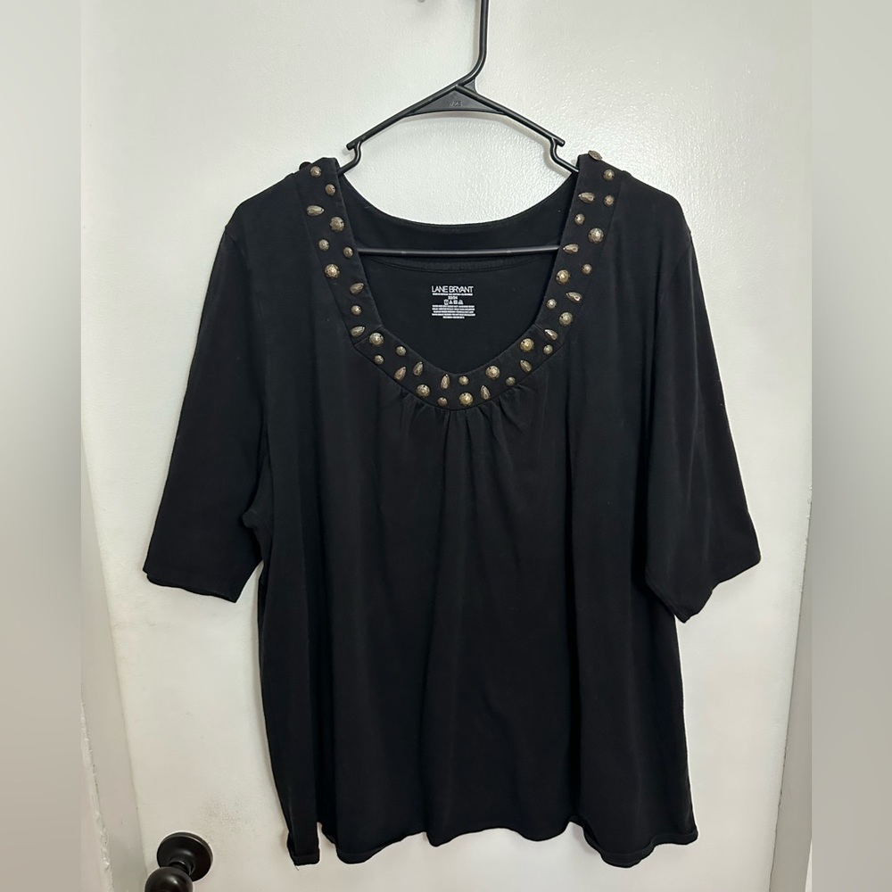 Lane Bryant size 22/24 black top with 3/4 length sleeves and stones.